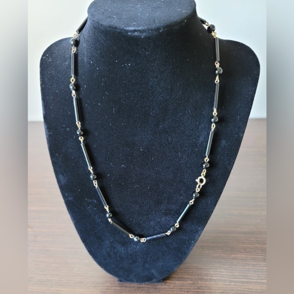 Black and golden beaded necklace